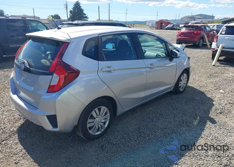 2015 Honda Fit Lx z USA, uszkodzony, nr VIN 3HGGK5H57FM738052